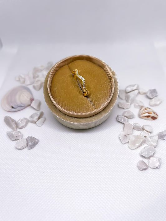 Anillo Ola con Zirconias Ajustable