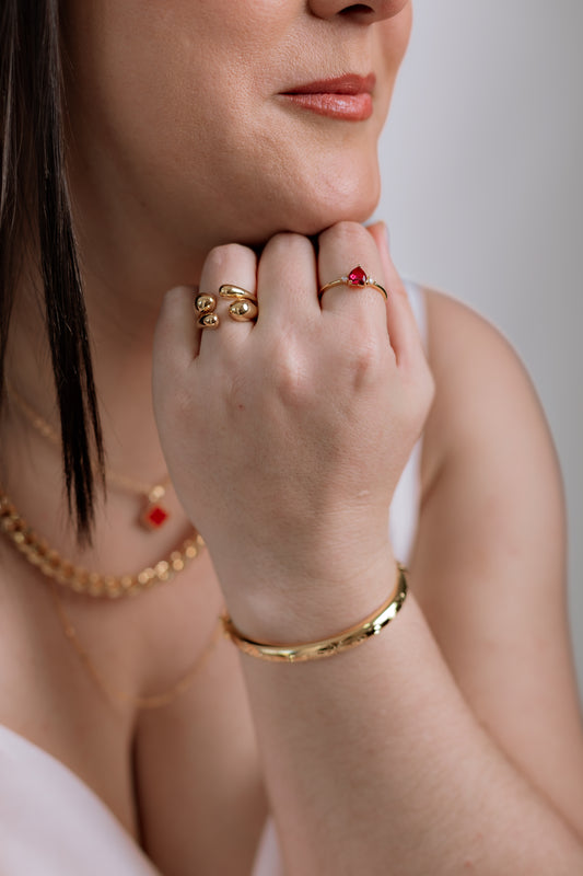 Anillo regulable con cuatro gotas