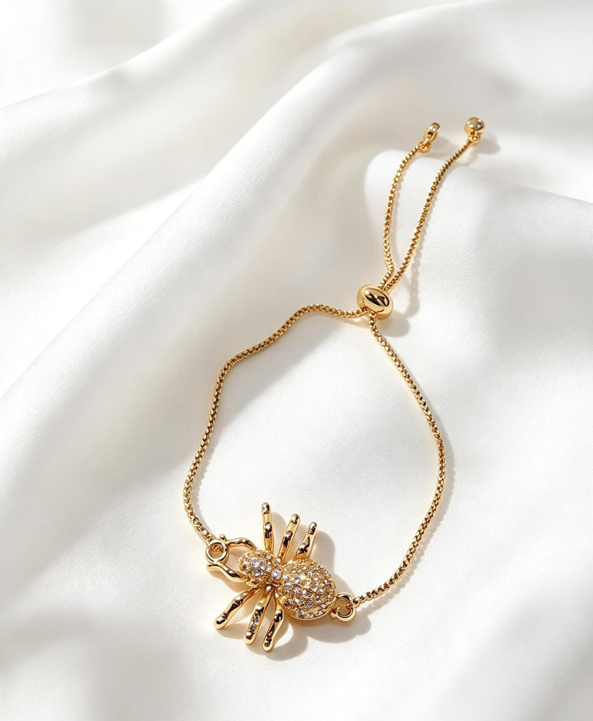 Pulsera con microcirconias forma de araña en oro