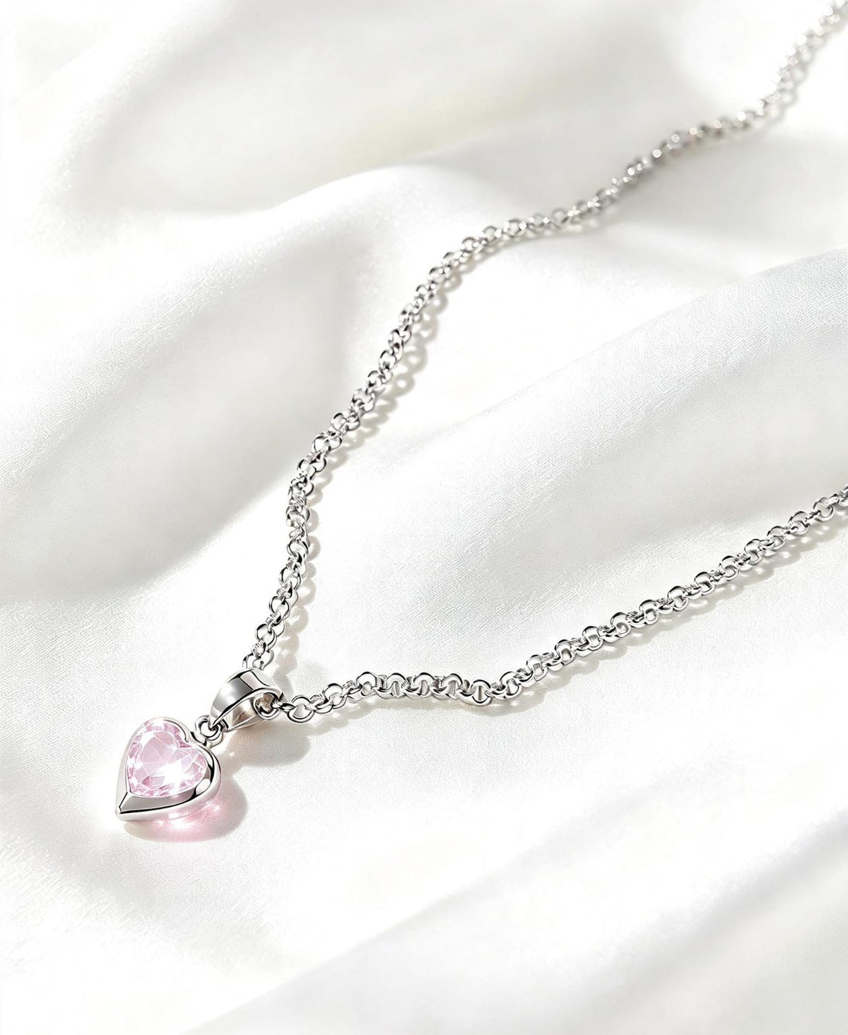 Collar corazón luz rosada en plata