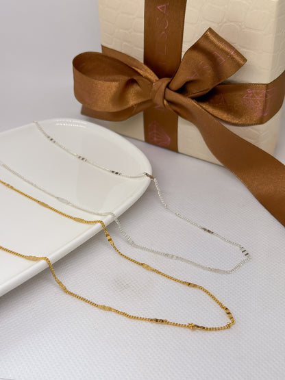 Collar largo con chapitas