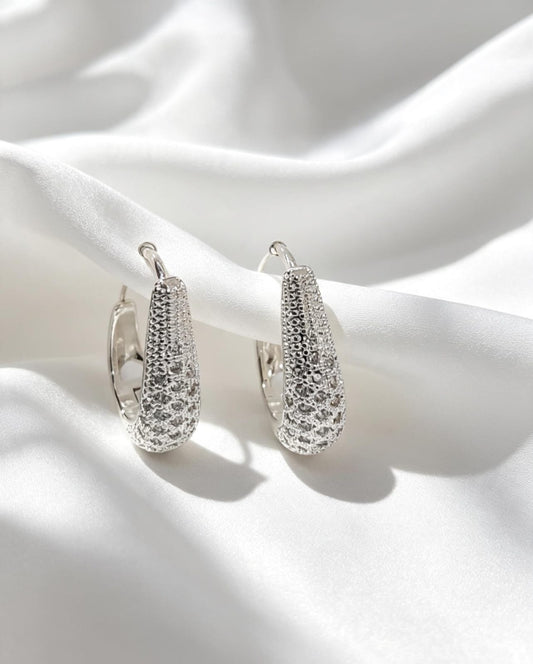 Argola Eva ovalada com zircônias