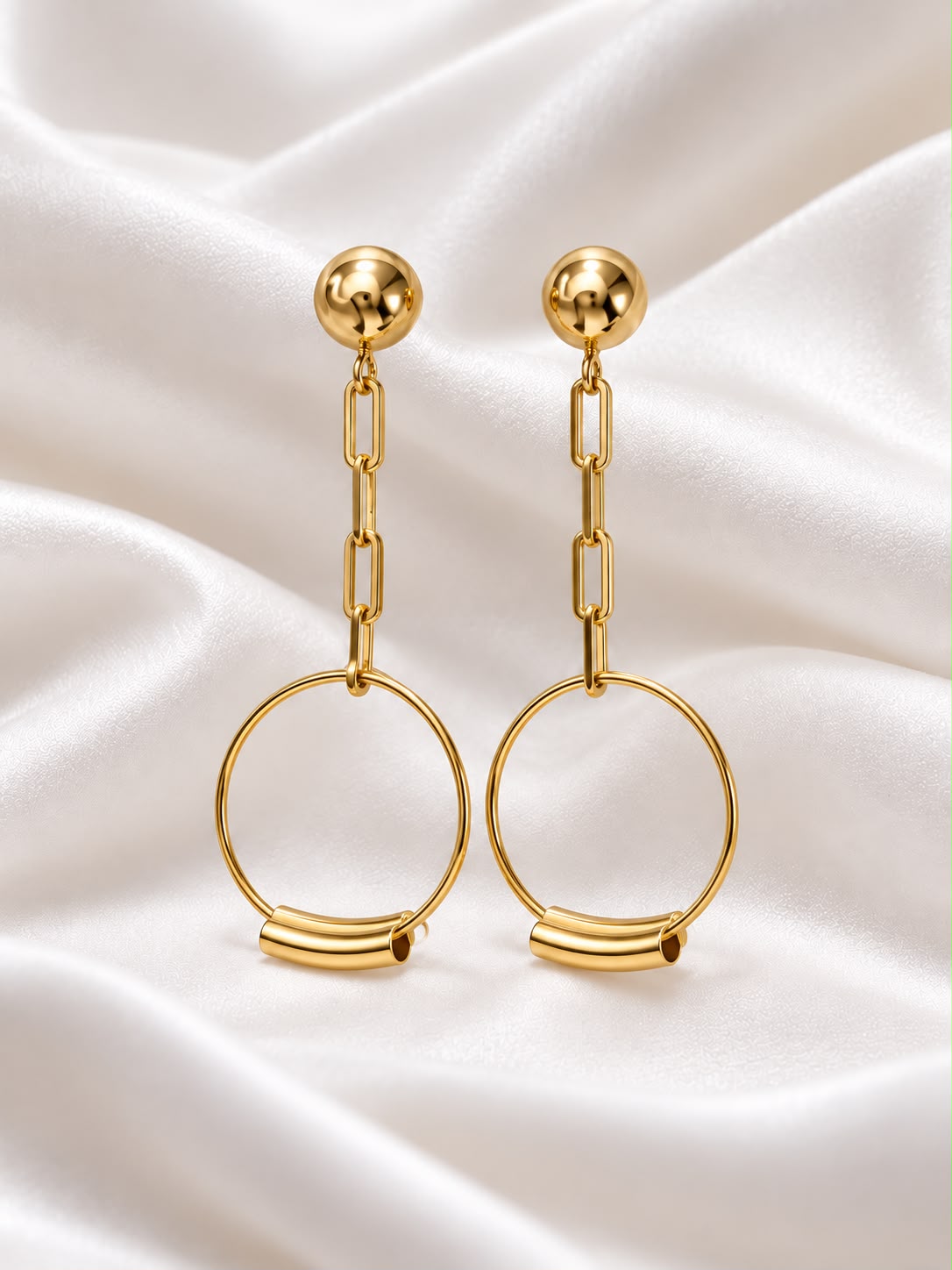 Caravanas largas con aro circular en baño de oro