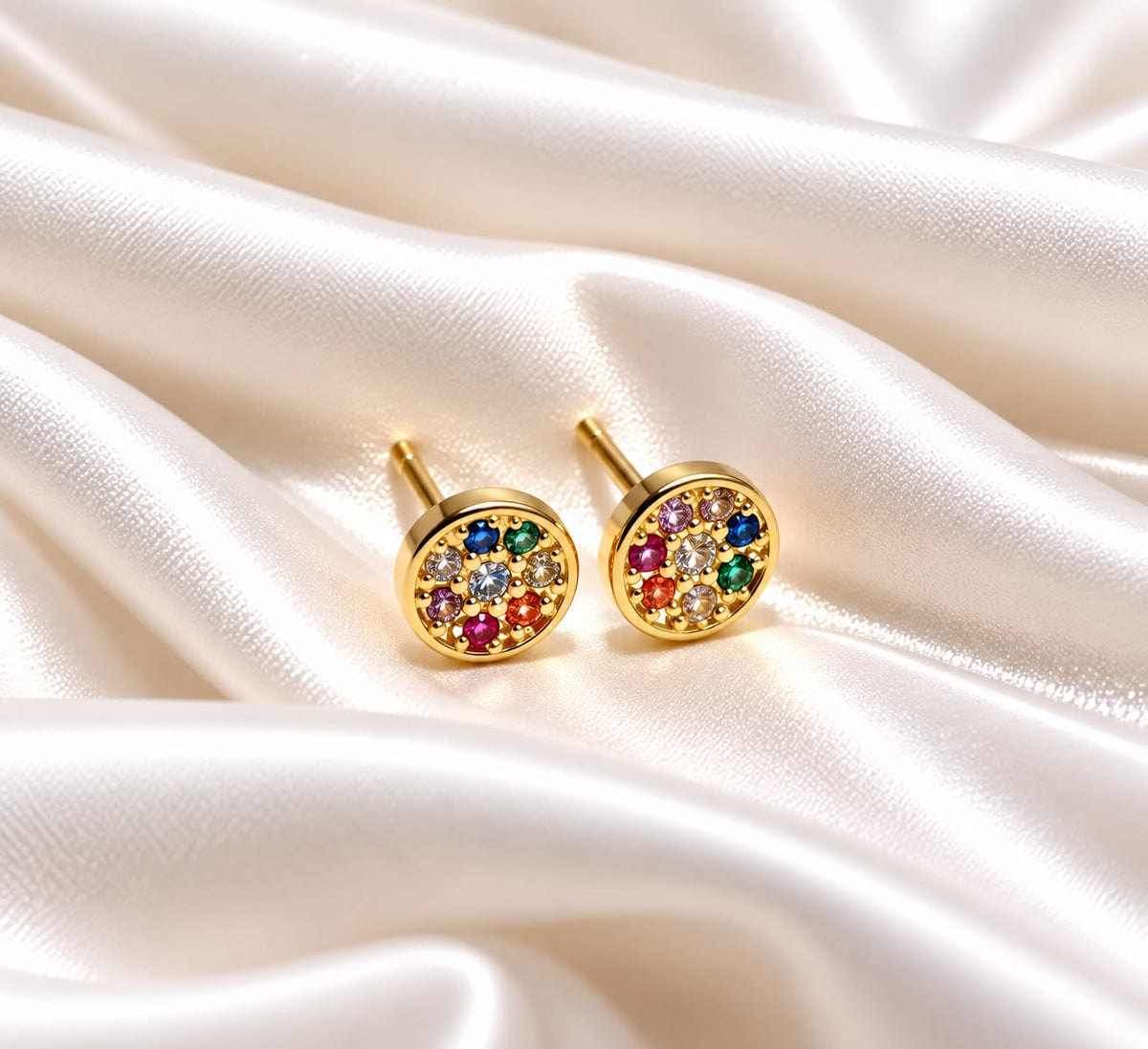 Aritos con microcirconias coloridas en oro