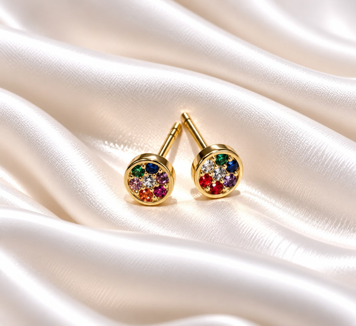 Aritos con microcirconias coloridas en oro
