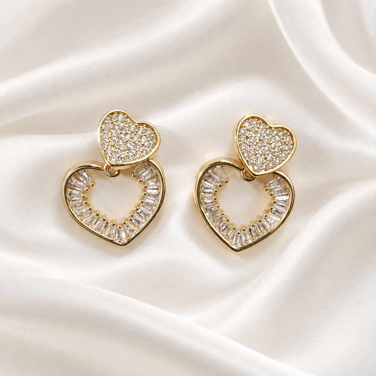 Caravanas en forma de corazón en oro