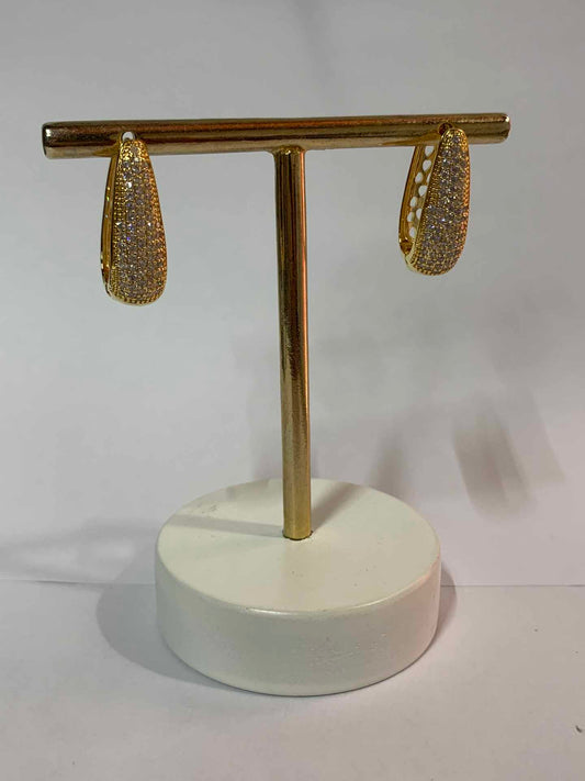 Argola Paola ovalada com zirconia