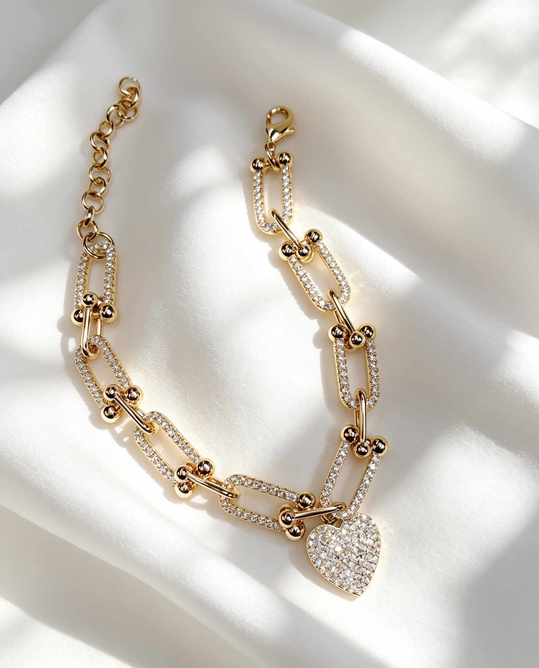 Pulseira elos cravejada coracao