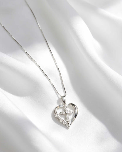 Corazón con cruz central 