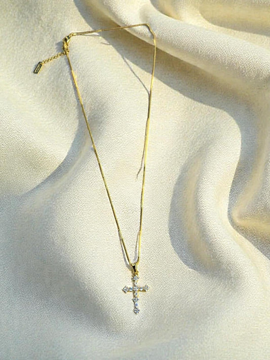 Cruz delicada con circonias