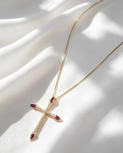 Cruz con circonias blancas y fuscias